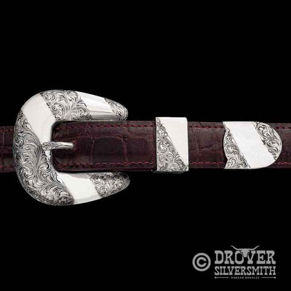 Discover The Top Hand Sterling Silver Buckle Set, a truly unique half polished half hand engraved buckle set perfect for a 1 inch width belt. Add a second loop for a ranger buckle set now!